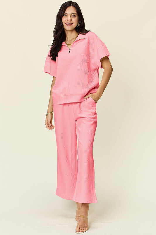 Double Take Full Size Texture Half Zip Short Sleeve Top and Pants Set - Premium Top and Pants Set from Trendsi - Just $45! Shop now at Zee's Pieces