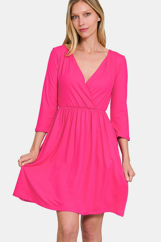 Zenana Three-Quarter Sleeve Surplice Dress with Pockets - Premium Dresses from Trendsi - Just $25.90! Shop now at Zee's Pieces