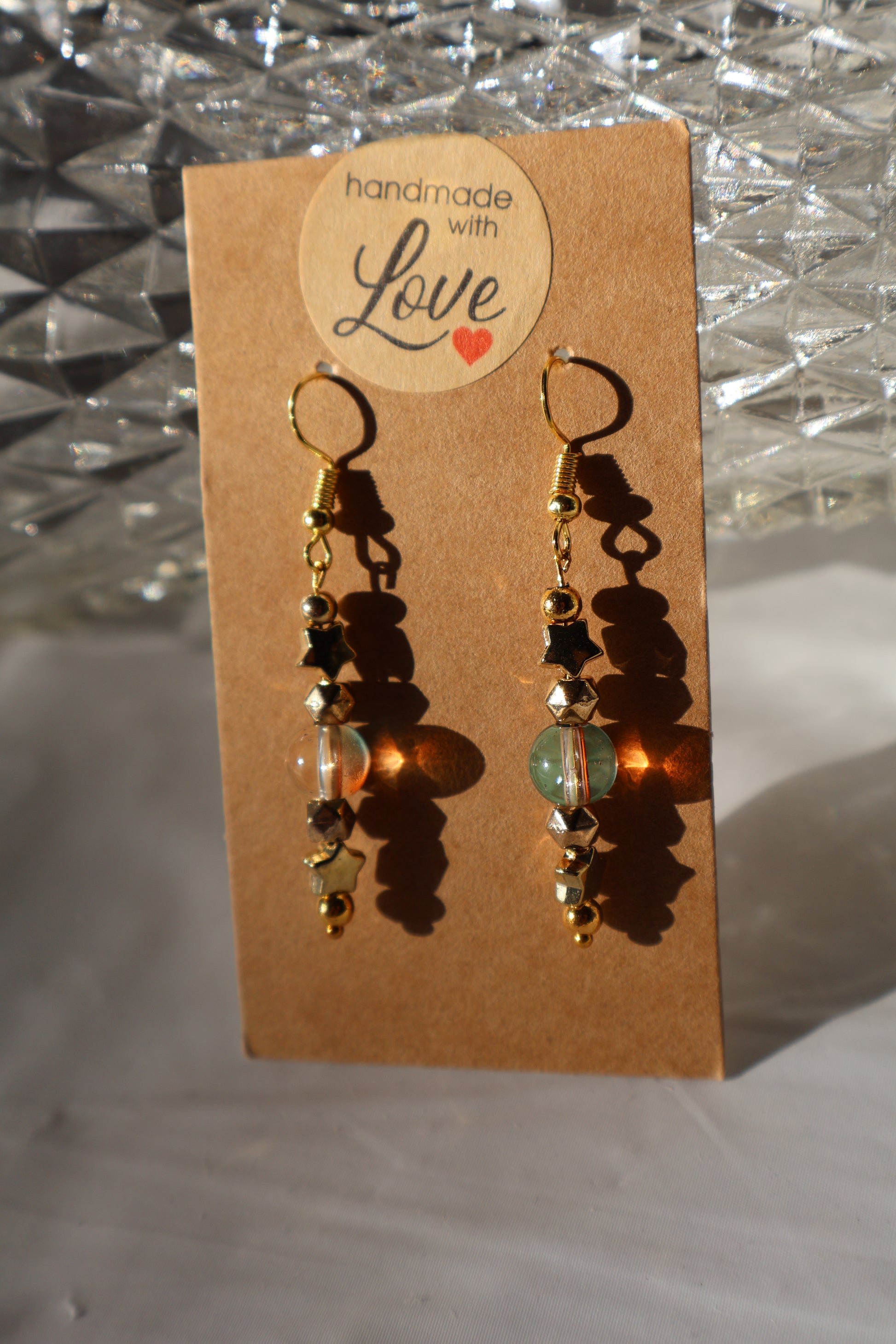 Starry Dangle Earrings with Beautiful Green and Orange Tinted Glass Bead - Premium Earrings from Zee's Pieces - Just $15! Shop now at Zee's Pieces