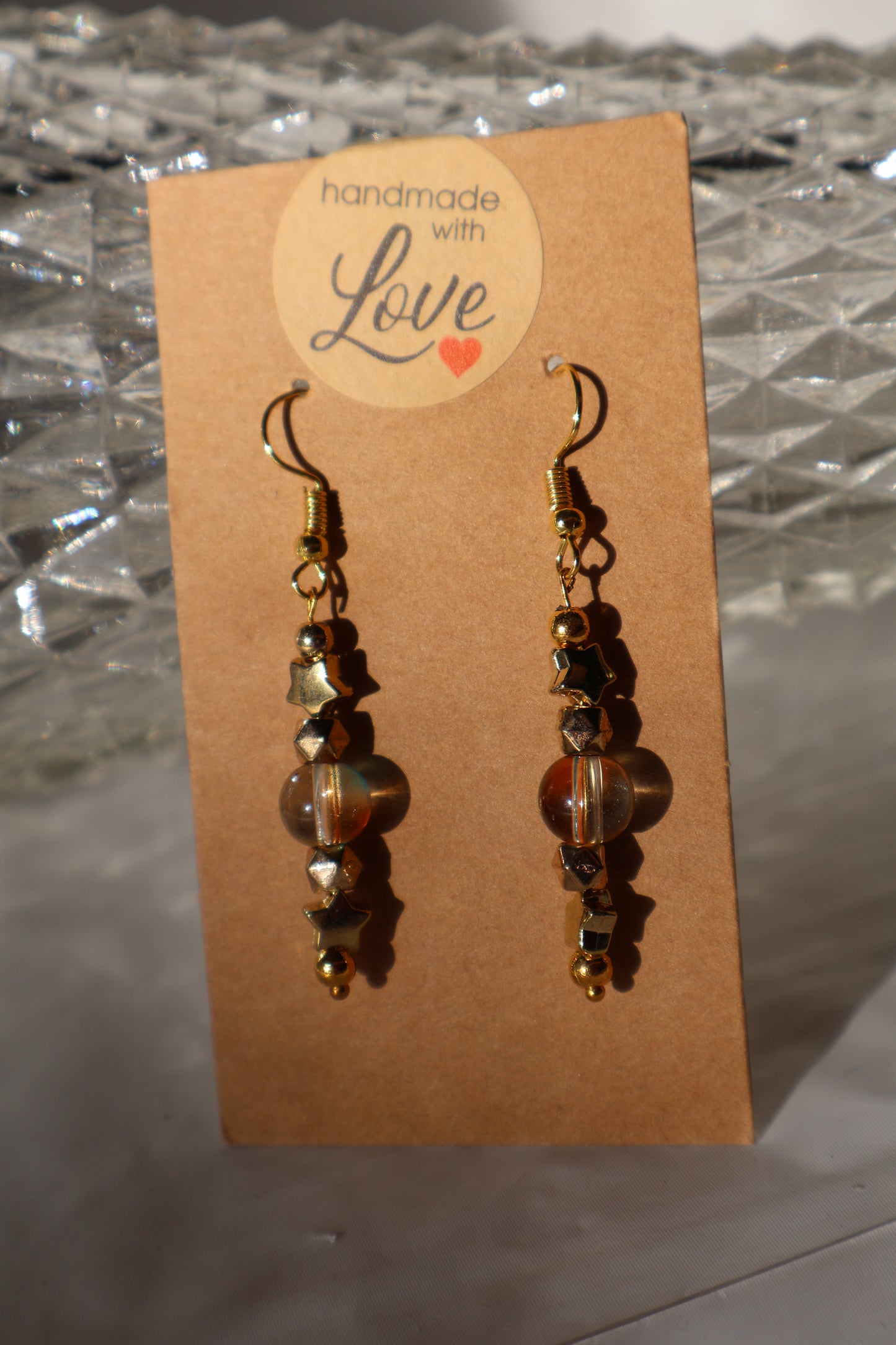 Starry Dangle Earrings with Beautiful Green and Orange Tinted Glass Bead - Premium Earrings from Zee's Pieces - Just $15! Shop now at Zee's Pieces