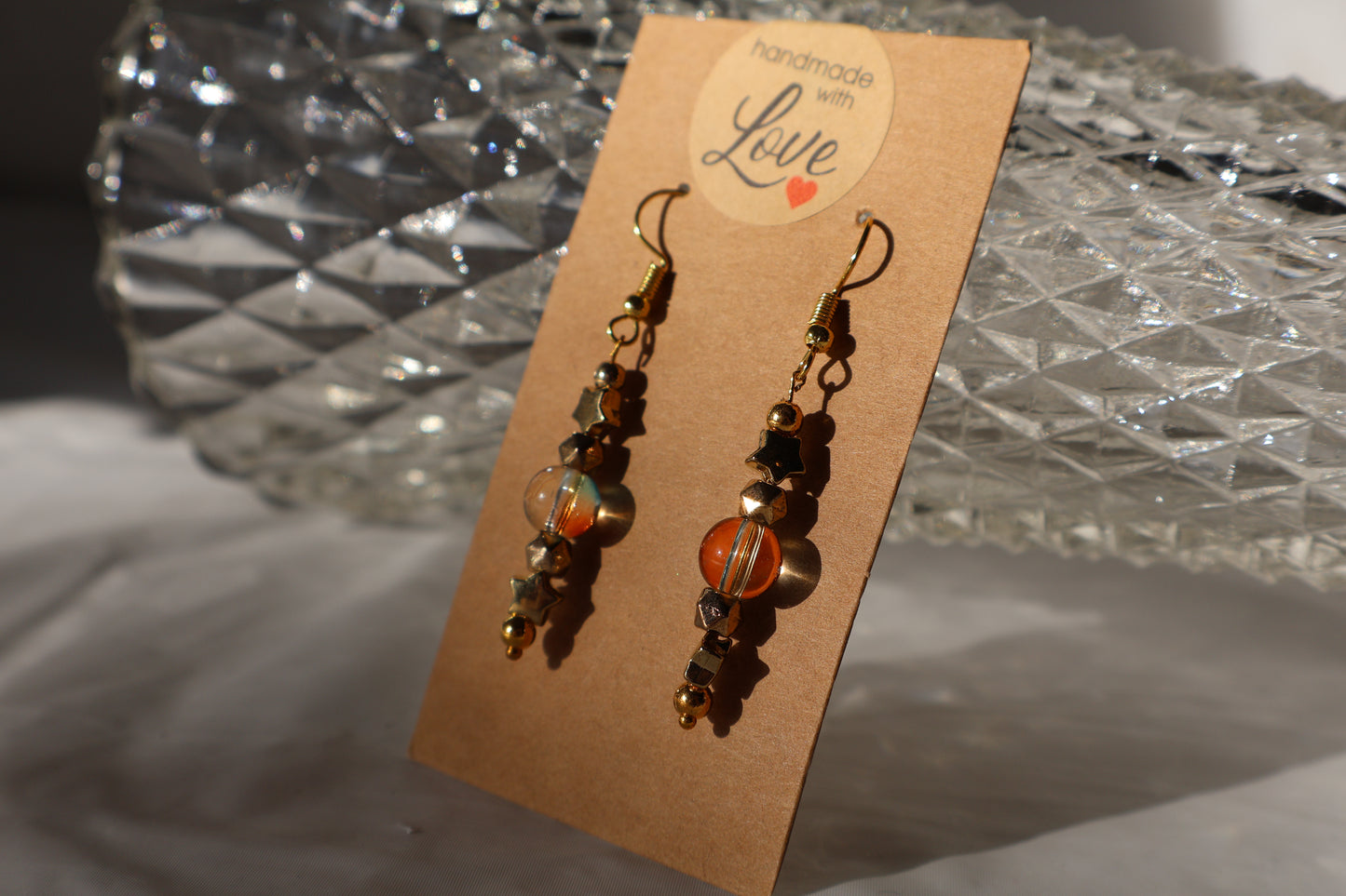 Starry Dangle Earrings with Beautiful Green and Orange Tinted Glass Bead - Premium Earrings from Zee's Pieces - Just $15! Shop now at Zee's Pieces