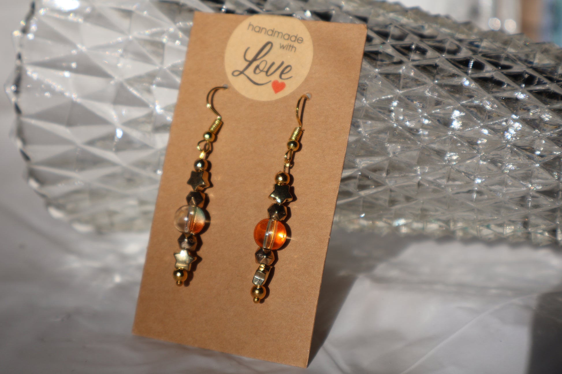 Starry Dangle Earrings with Beautiful Green and Orange Tinted Glass Bead - Premium Earrings from Zee's Pieces - Just $15! Shop now at Zee's Pieces