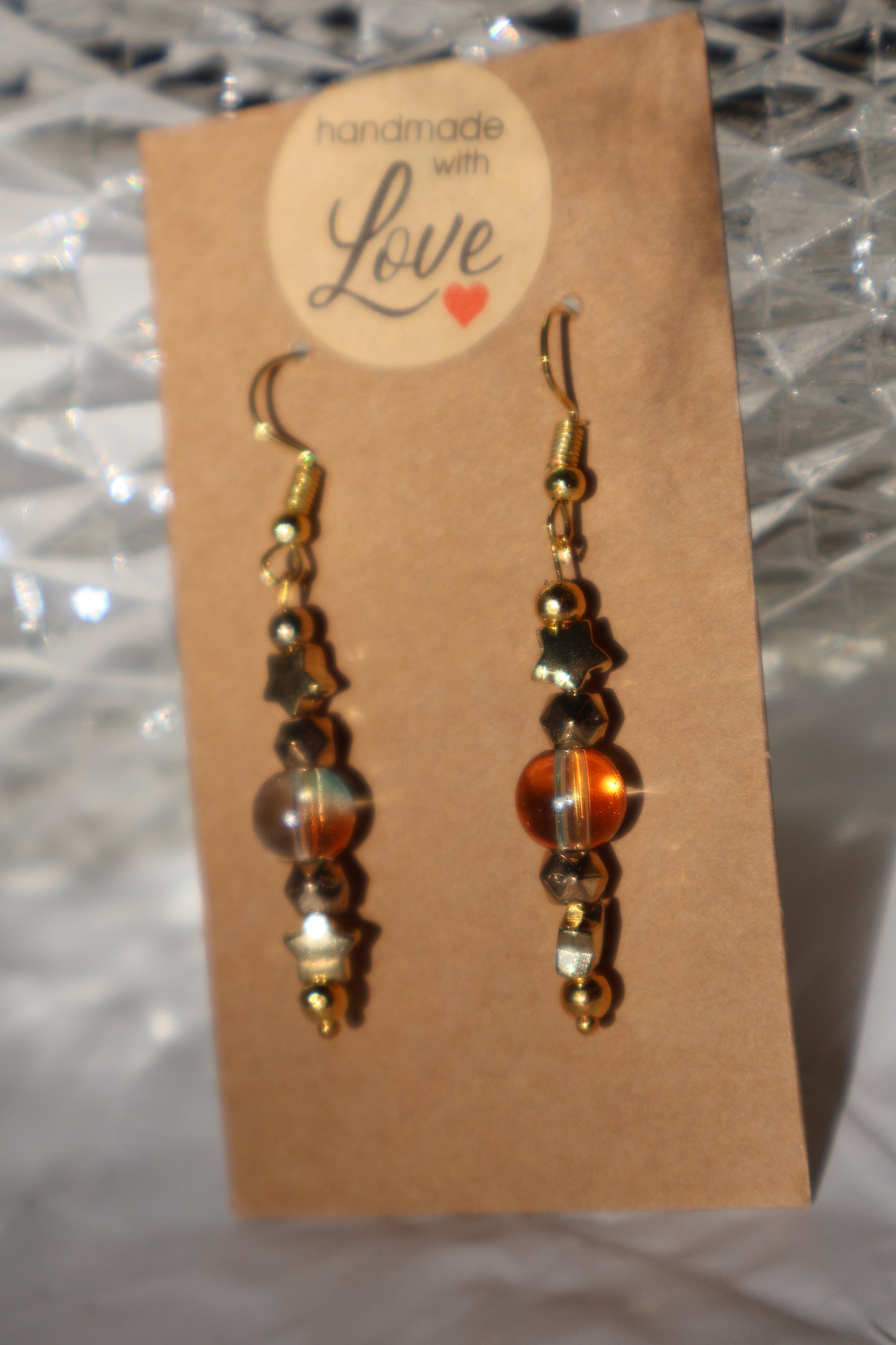 Starry Dangle Earrings with Beautiful Green and Orange Tinted Glass Bead - Premium Earrings from Zee's Pieces - Just $15! Shop now at Zee's Pieces