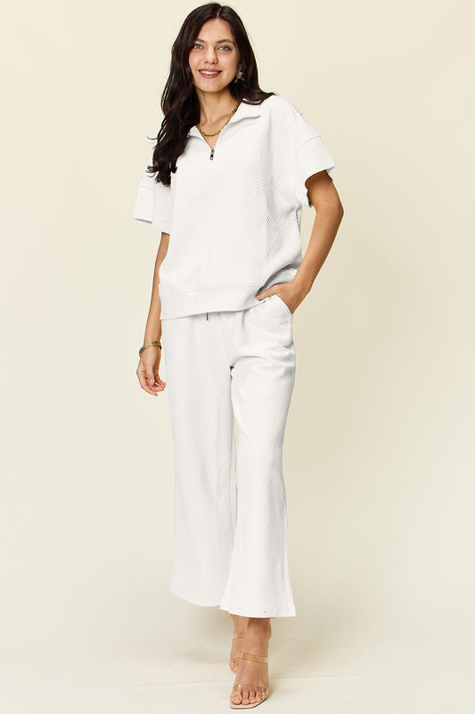 Double Take Full Size Texture Half Zip Short Sleeve Top and Pants Set - Premium Short and Pants Set from Trendsi - Just $45! Shop now at ZeesPieces