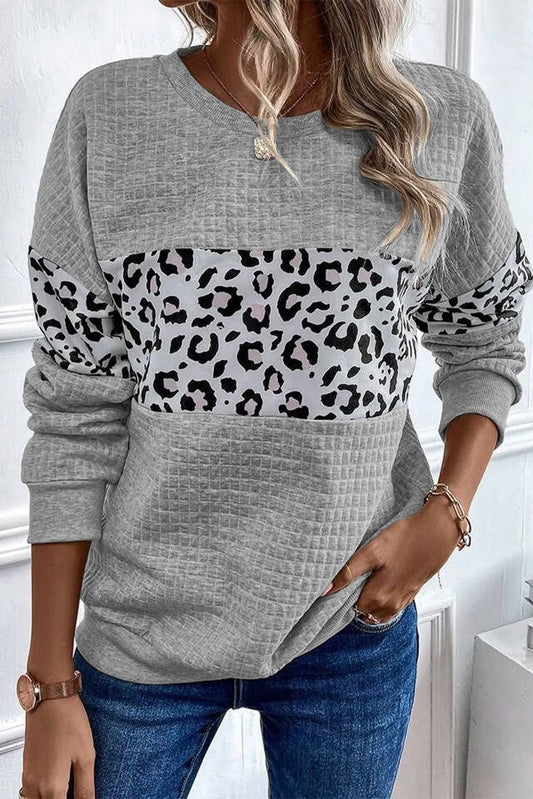 Leopard Round Neck Long Sleeve Sweatshirt - Premium Sweatshirt from Trendsi - Just $23.56! Shop now at Zee's Pieces